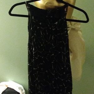 All pleated dress. Adorable on. I have 2 of them.